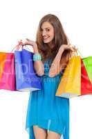 attractive young woman with colorful shopping bags isolated