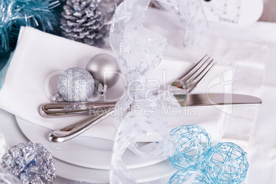 Stylish blue and silver Christmas table setting