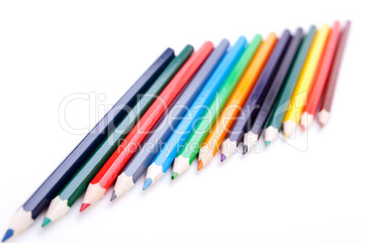 Bunch of colourful pencil crayons on white