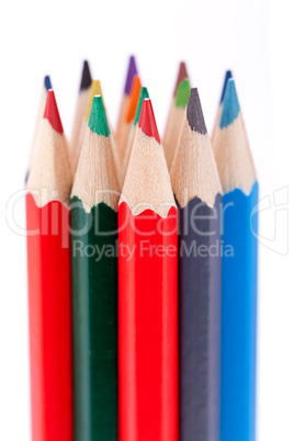 Bunch of colourful pencil crayons on white