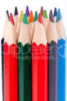 Bunch of colourful pencil crayons on white