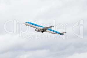 Commercial airliner flying midair after takeoff