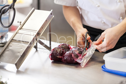 Chef slicing boiled beetroot