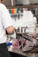 Chef slicing boiled beetroot