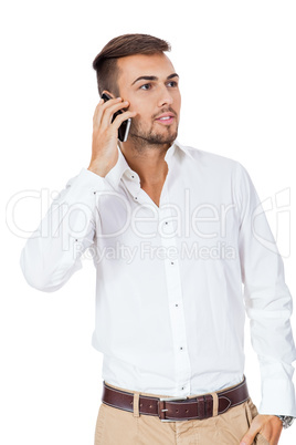 Handsome man reading a message on his mobile