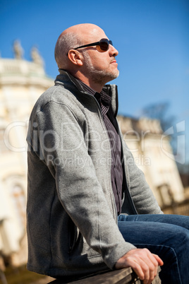 Stylish man in sunglasses enjoying the sun