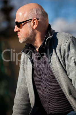 Stylish man in sunglasses enjoying the sun