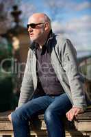 Stylish man in sunglasses enjoying the sun