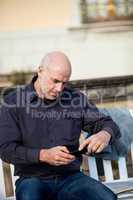 Man checking a photo on his mobile phone