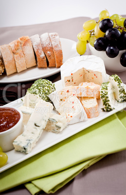 cheese plate with grapes and wine dinner