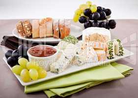 cheese plate with grapes and wine dinner