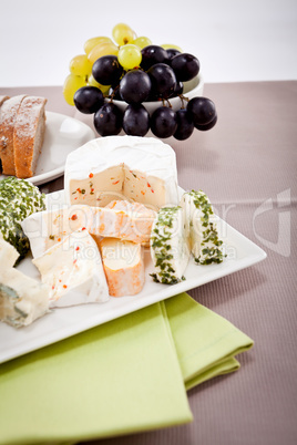 cheese plate with grapes and wine dinner