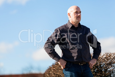 Thoughtful man sitting on a flight of steps