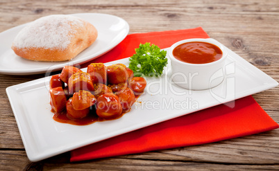 curry wurst spicy sausage with curry and ketchup