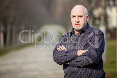 Confident attractive man standing waiting