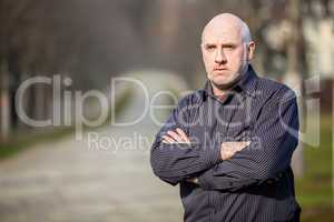 Confident attractive man standing waiting