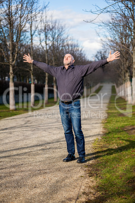 Middle-aged man enjoying the sunshine