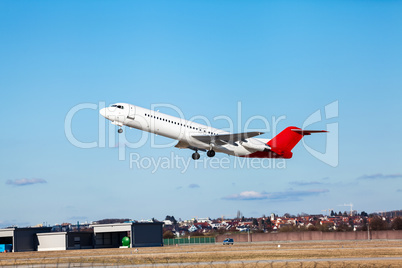 Passenger airliner taking off at an airport