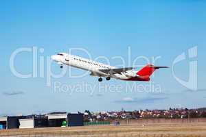 Passenger airliner taking off at an airport