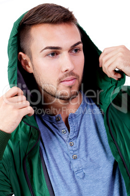 young adult man with green jacket portrait isolated