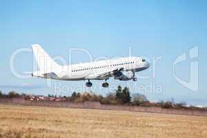 Passenger airliner taking off at an airport