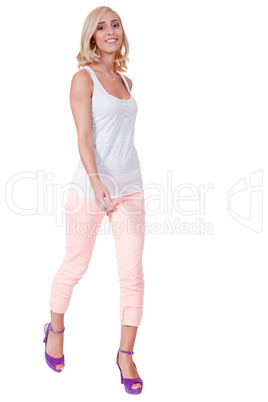 attractive young smiling blonde woman isolated