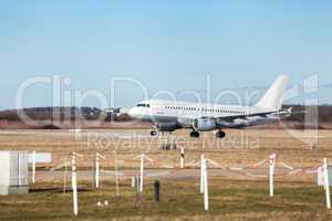 Passenger airliner taking off at an airport