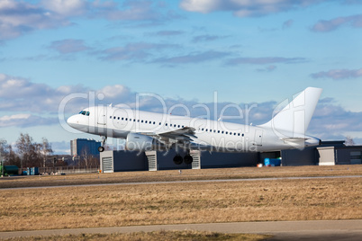 Passenger airliner taking off at an airport