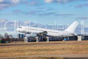 Passenger airliner taking off at an airport