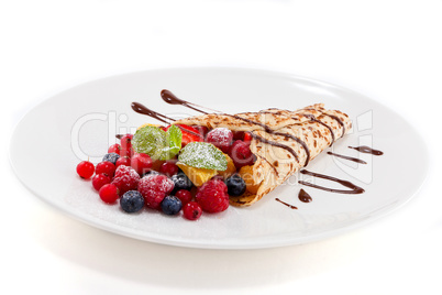 fresh tasty homemade crepe pancake and fruits