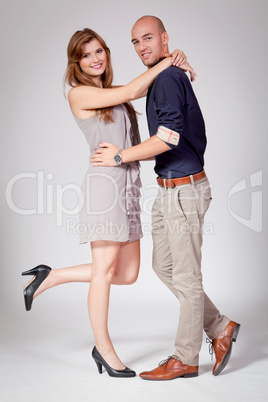 young attractive couple in love embracing portrait