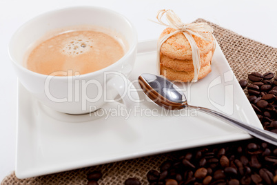 fresh aromatic coffee and cookies on table