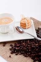 fresh aromatic coffee and cookies on table