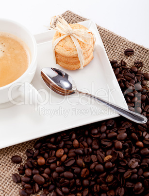 fresh aromatic coffee and cookies on table