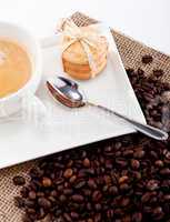 fresh aromatic coffee and cookies on table