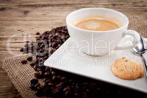 fresh aromatic coffee and cookies on table