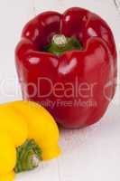 Red and Yellow Peppers on White Background