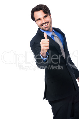 Enthusiastic businessman giving a thumbs up