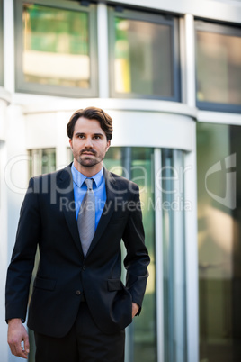 Businessman standing waiting for someone