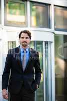 Businessman standing waiting for someone