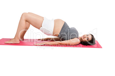 Active pregnant woman working out