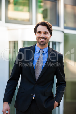 Businessman standing waiting for someone