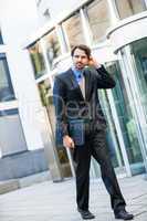 Businessman standing waiting for someone