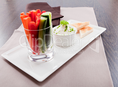 fresh vegetables and cream cheese dip snack