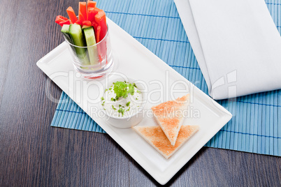 fresh vegetables and cream cheese dip snack