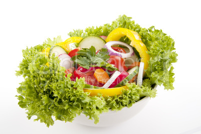 fresh tasty mixed salad with different vegetables isolated