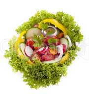 fresh tasty mixed salad with different vegetables isolated