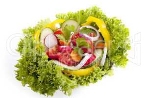 fresh tasty mixed salad with different vegetables isolated