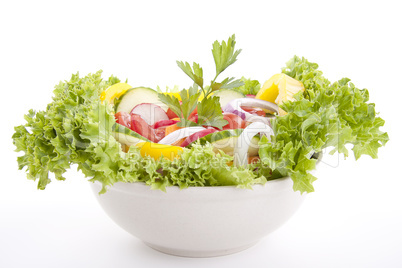 fresh tasty mixed salad with different vegetables isolated