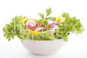 fresh tasty mixed salad with different vegetables isolated